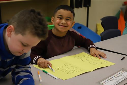 Smiling student in a Jefferson Elementary classroom